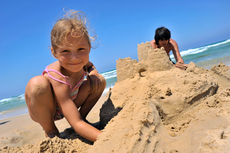 building sand castles on the beach
